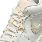 Jordan 1 Low SE Metallic Team Gold (Women's)