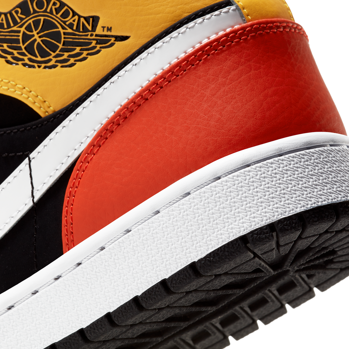 Jordan 1 Mid Black Amarillo Orange